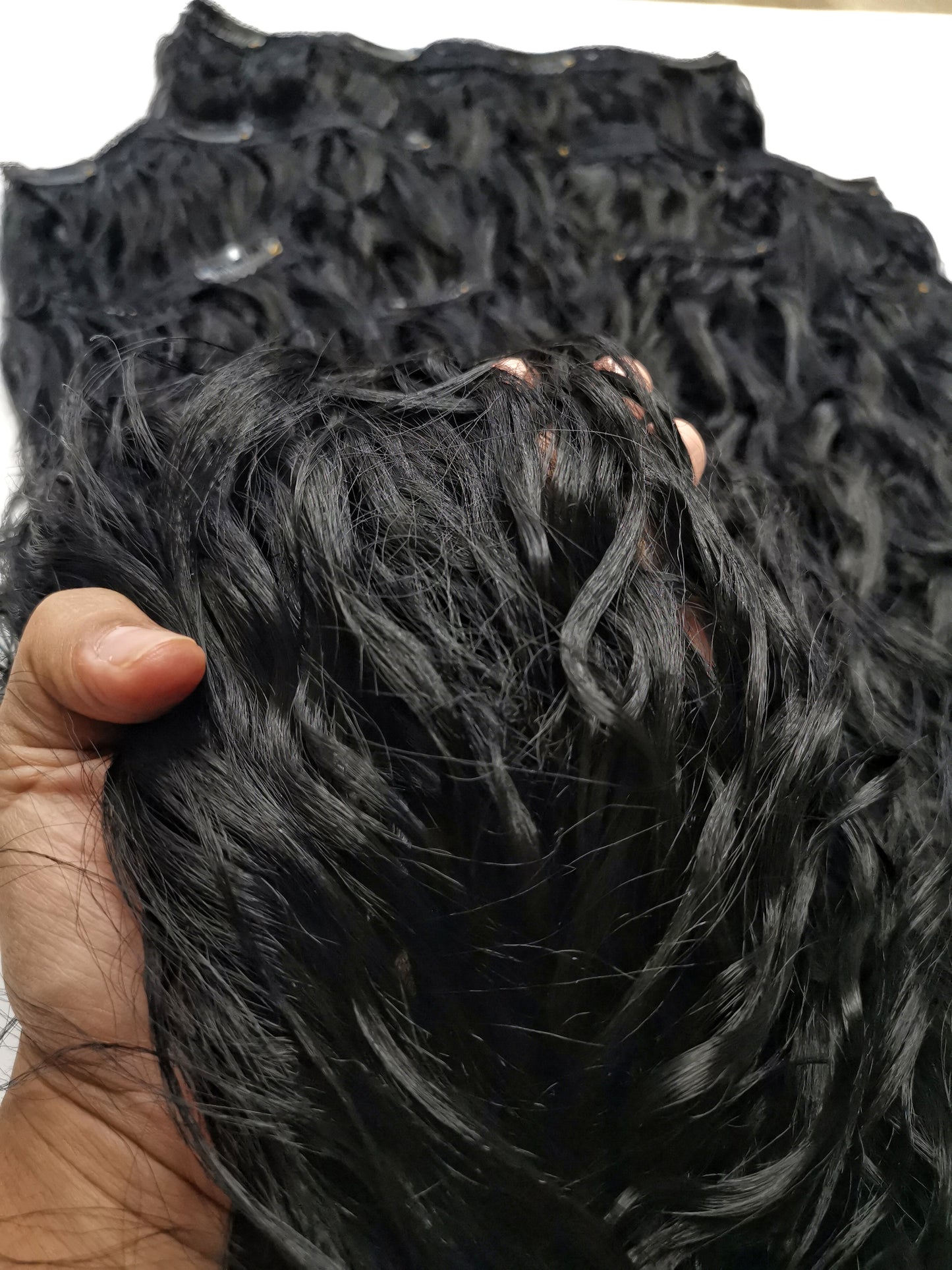 Human-like clip-in hair extensions - curly black